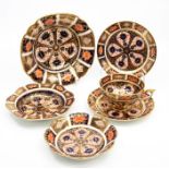 Four Royal Crown Derby Imari 1128 pattern dishes, along with an Imari cup and saucer (5)
