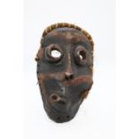 An African Tribal mask  Provenance: from a Private collection in Scotland of a Professor who used to