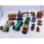 Triang: A Triang Minic plastic clockwork Standard Vanguard part boxed, and Morris Minor unboxed,