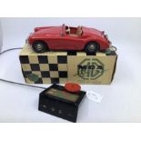 Victory: A boxed Victory Industries, Surrey, remote control, battery operated, MGA, red with tan