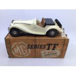 Victory: A boxed Victory Industries, Surrey, battery operated, 1:18 Scale, MG Series TF, ivory white
