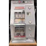 Bandit: A Silver Jubilee Mark 1, one arm bandit slot machine. Refurbished and working on original 6d