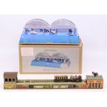 Tinplate: A boxed Walter & Prediger, tinplate, revolving boats under bridge, tested, appears to be