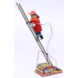 Marx: A boxed Marx, battery operated, Climbing Fireman, Made by Marx, Japan, damage to box lid,