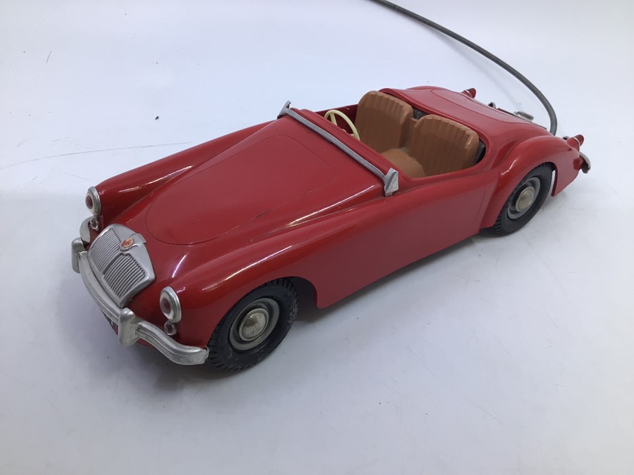 Victory: A boxed Victory Industries, Surrey, remote control, battery operated, MGA, red with tan - Image 2 of 4