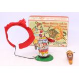 Cragstan: A boxed Tokyo Playthings, Clown Making the Lion Jump Thru the Flaming Hoop, mechanism in