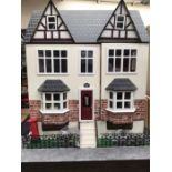 Dolls House: A wooden four storey dolls house, complete with contents including various items of