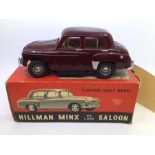 Victory: A boxed Victory Industries, Surrey, battery operated, 1:18 Scale, Hillman Minx, maroon body