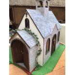 Dolls House/Church: a quality dolls House in the form of a Church.  furnished and includes people