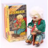 Alps: A tinplate, Mechanical Little Shoemaker, Made in Japan, clockwork, working order, contained