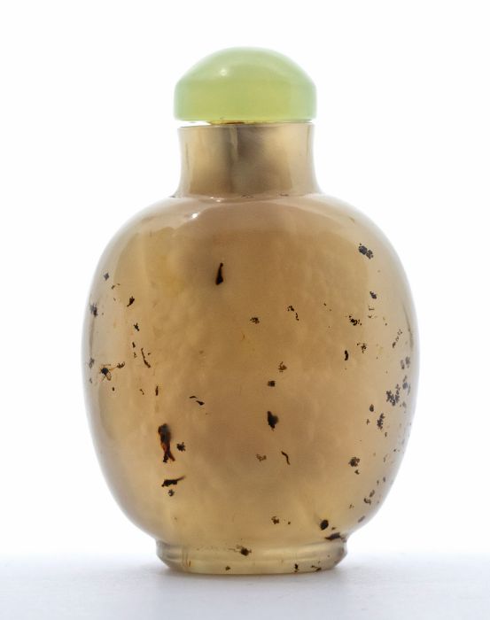 A Chinese agate snuff bottle and jade stopper, of flattened ovoid form, 6.5cm high, Qing dynasty,