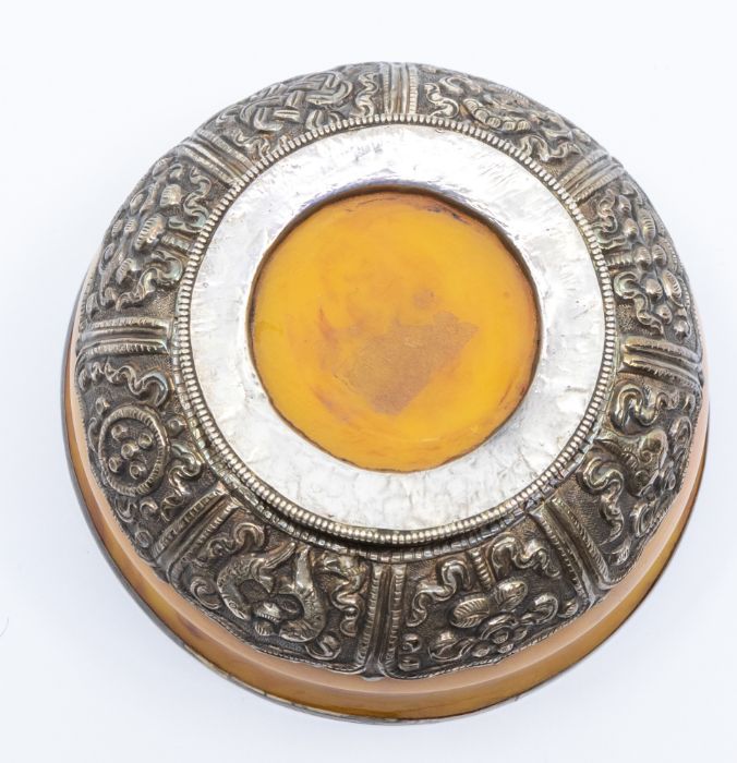 A Bhutan silver-mounted amber bowl, the base of the bowl with lappets decorated in repoussé with the - Image 3 of 4