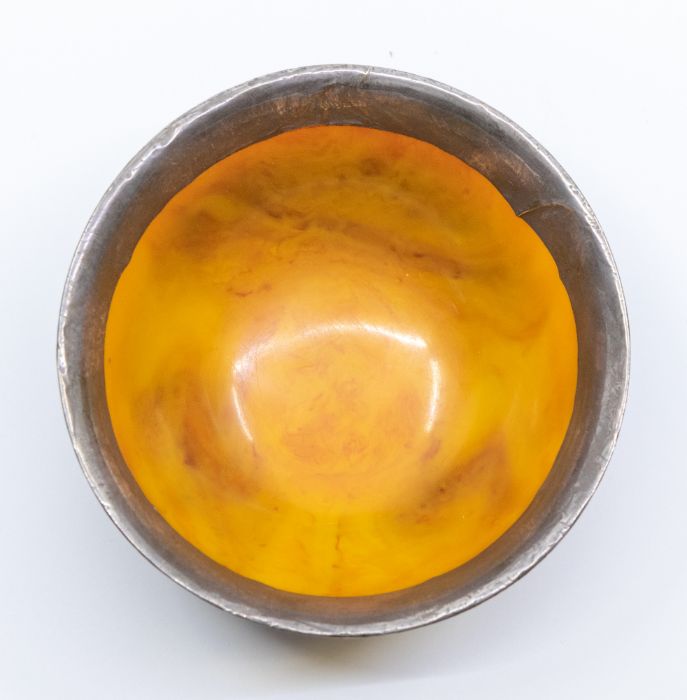 A Bhutan silver-mounted amber bowl, the base of the bowl with lappets decorated in repoussé with the - Image 4 of 4