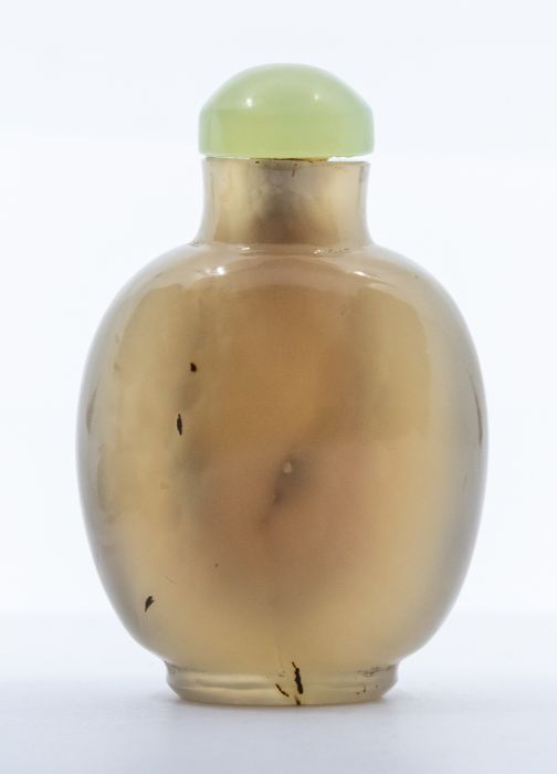 A Chinese agate snuff bottle and jade stopper, of flattened ovoid form, 6.5cm high, Qing dynasty, - Image 2 of 2