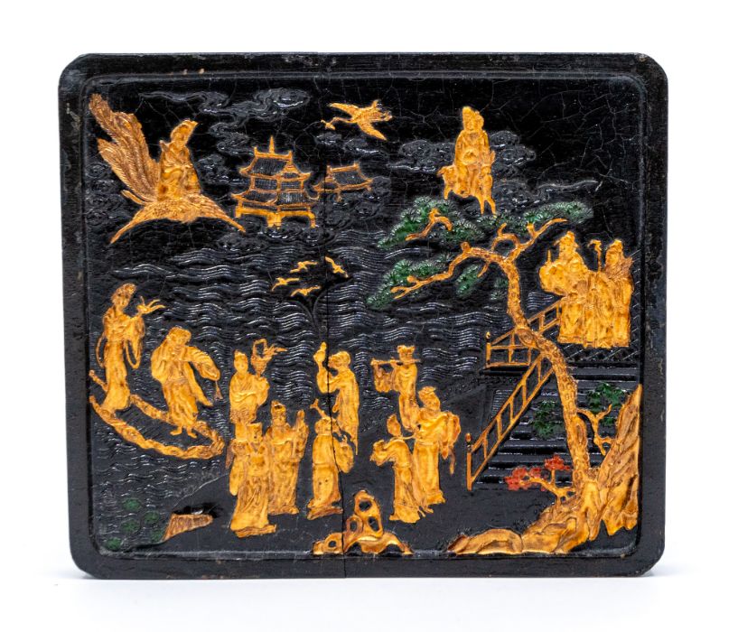 A large Chinese square black, gilt and coloured ink cake, the upper surface moulded with Shoulao and