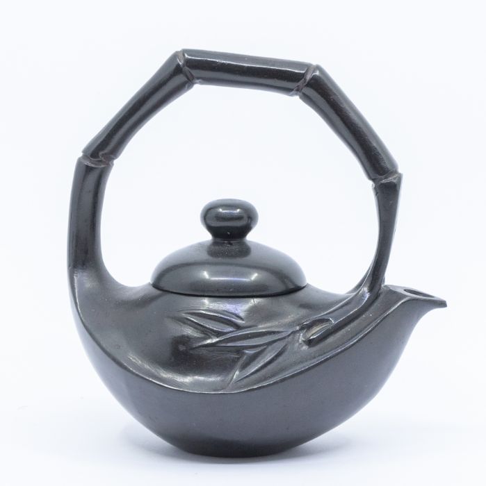 A black shousan stone teapot and cover, carved with a simulated bamboo overstrung handle, over a - Image 2 of 3