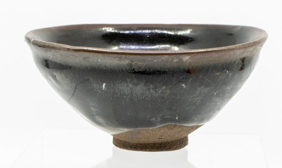 A Chinese Jian black ‘hares fur’ bowl, the steep rounded sides rising from a short spreading foot