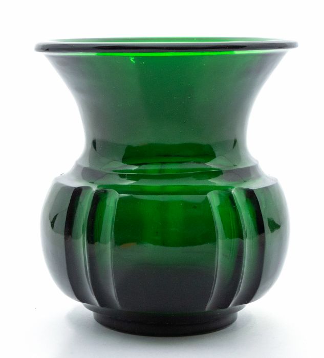 A Chinese Beijing green glass jar, the globular fluted body rising from a short foot to a waisted