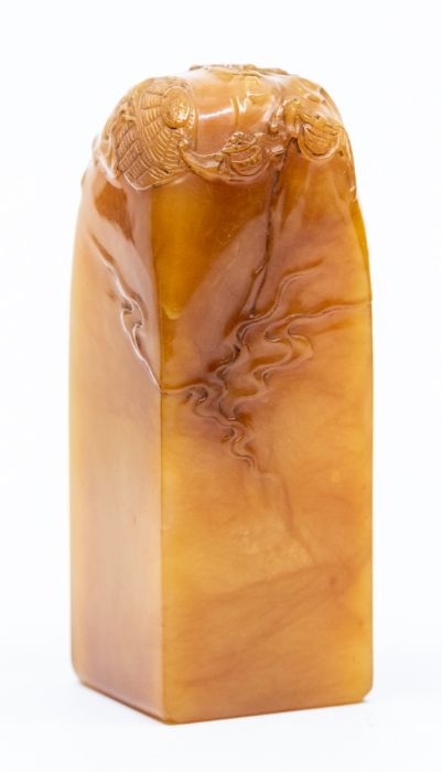 A shousan stone seal, the top carved with five bats, the stone of a deep amber colour, 5.5cm high, - Image 2 of 4