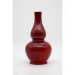 A Bernard Moore double gourd vase with deep oxblood red glaze, shape number 1068. Height approx