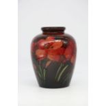 Moorcroft African Lily Flambe 216 shape vase, 16cms high approx, 1945-1949, signature, Royal Warrant