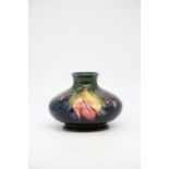 Moorcroft Leaf and Berry on green ground vase, 8cms high approx, W Moorcroft signature, potter to HM