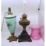 A 19th cent opaline  lamp and a cranberry glass oil lamp shade