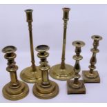 Three various pairs of brass candlesticks