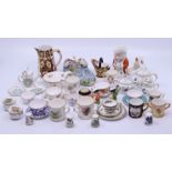 A collection of hand painted and porcelain miniatures including Worcester , Derby and similar