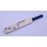 A signed Pakistan and India cricket bat,