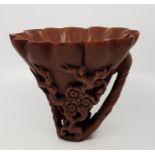 An early 20th century Chinese horn libation cup, height 14.7cm.