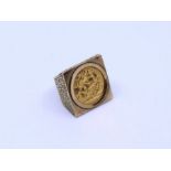 A gold 1914 half sovereign square shaped ring