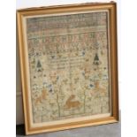 A framed 1825 sampler