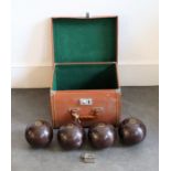 A set of vintage lignium bowling balls