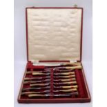 An oak cased Mappin and Webb cutlery set and cased  horn cutlery set