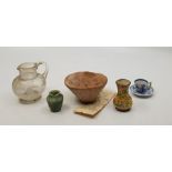 A small Roman earthenware vessel, diameter approx. 8.5cm, together with a Mary Gregory glass jug and