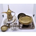 A collection of metalware to include Indian silver cups, silver plate and Indian brassware a