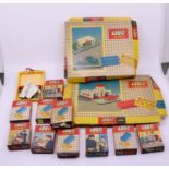 A quantity of vintage boxed lego and loose pieces