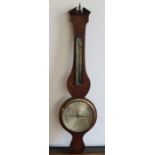 A George III mahogany wheel barometer c. 1800 , in a shaped case inlaid with paterae and shells. the
