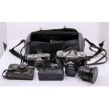 A Nikomat FT 4457028 camera in case, Olympus Trip 35 camera and quantity of other cameras and lens