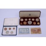 A specimen coin set and bank notes