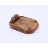 A carved mouseman ashtray