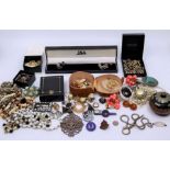 A collection of nurses and hospital related badges and a collection of costume jewellery