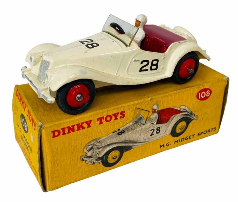 Dinky Toys 108 M.G. Midget Sports Car Boxed. Presented in Cream Bodywork with Burgundy Interior,