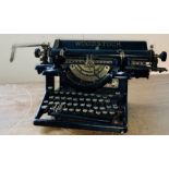An early 20th century Woodstock Typewriter model 8-14in, made in Chicago, USA.  Provenance:  The