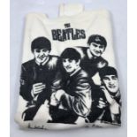 Beatles interest, a cream Beatles jumper together with six Beatles fan club albums comprising: The