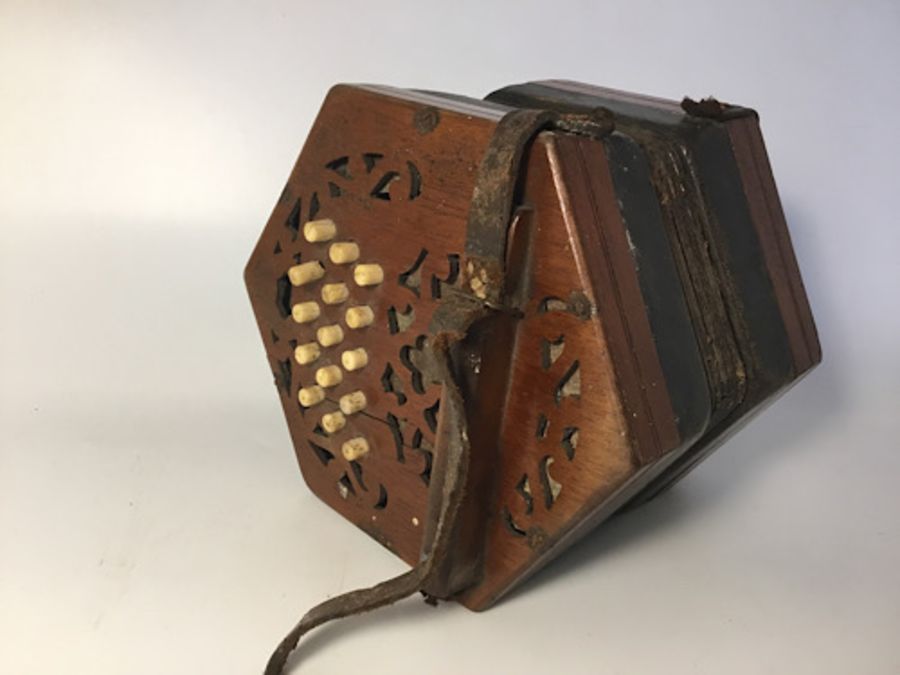 A hexagonal concertina, 30 buttons, leather straps broken, bellows in tact, missing oval makers name - Image 3 of 5