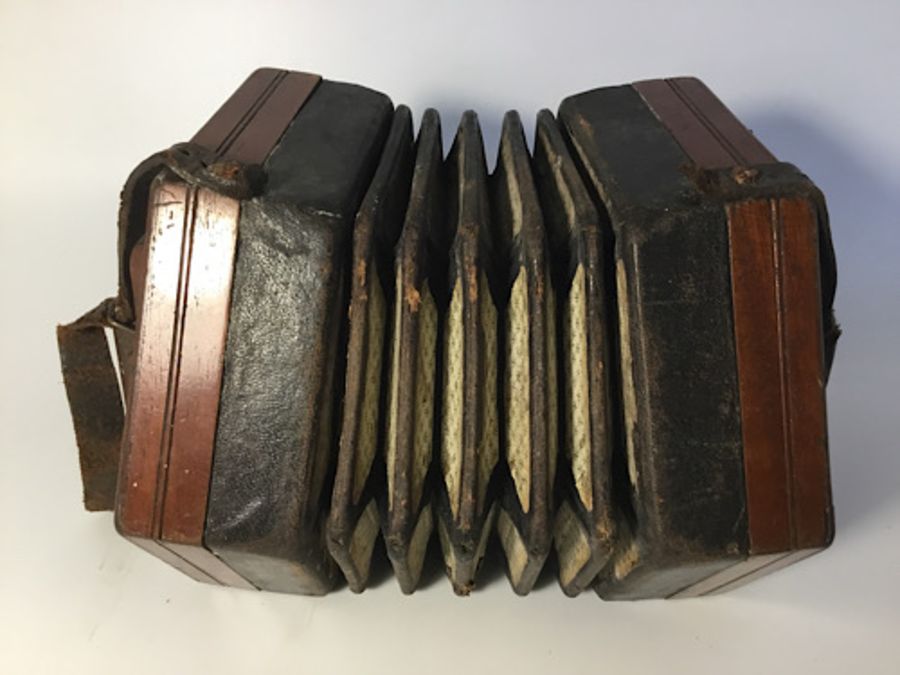 A hexagonal concertina, 30 buttons, leather straps broken, bellows in tact, missing oval makers name - Image 4 of 5