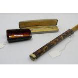 A "Yard o led" engine turned 9ct gold propelling pencil in original box, an amber coloured cheroot