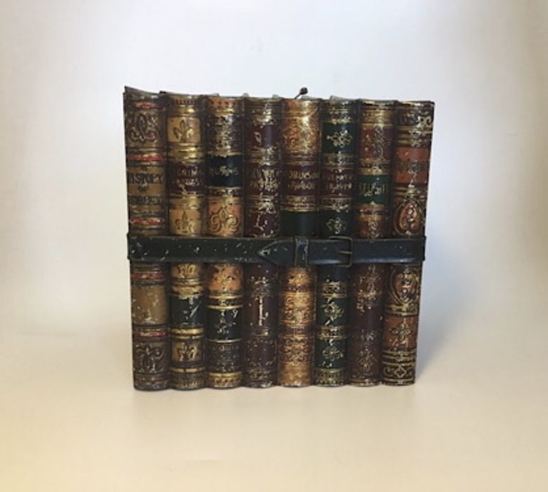 A Huntley & Palmers biscuit tin in the form of a bound stack of 8 books, printed name to base